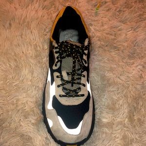 I’m selling grey black and yellow SNKR PROJECT